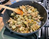 A picture of step 11 of Pork Sauté with Fennel and Cheesy Zucchini.