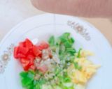 A picture of step 3 of Ajwain leaf salad with veggies and pineapple.