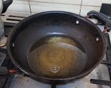 A picture of step 6 of Mango pickle.