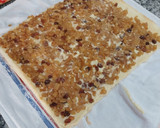Foto del paso 13 de la receta: Bracito relleno de crema de vainilla, manzana y pasas (sin gluten)