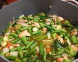 A picture of step 8 of Sinigang (sour soup).