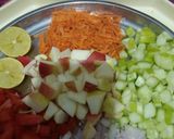 A picture of step 2 of Chickpea fruits veggies and nuts salad.