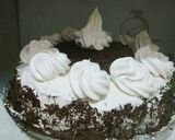 A picture of step 20 of Egg less Black Forest Cake.