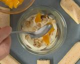 Foto del passaggio 5 della ricetta Tiramisù con Pesche sciroppate e Nocciole