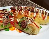 صورة لخطوة 3 من وصفة ساندويش الهوت دوغ (النقانق)