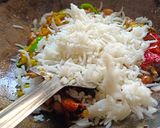 A picture of step 3 of Green raw mango rice.
