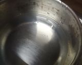 A picture of step 1 of Karak chai.