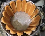 Une image de l'étape 6 de Charlotte aux abricots, orange et manzana.