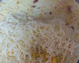 A picture of step 6 of Domino's style stuffed cheese garlic bread.