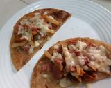 A picture of step 6 of Loaded chapati 'tacos'.