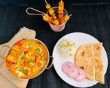 A picture of step 10 of Paneer Tikka Masala.