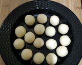 A picture of step 4 of Gulab Jamun with kesar Rabri.