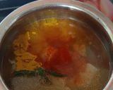 A picture of step 1 of BOKAKHAT POORI AALU BHAJI With Green Chilli Chutney.