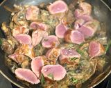A picture of step 6 of Pork tenderloin with mushroom, shallot and tarragon sauce.