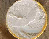 A picture of step 3 of Orange flavour cake on stove.