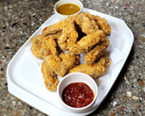 Foto del paso 5 de la receta: Alitas de pollo frito estilo KFC 🍗 acompañadas con salsa picante🌶️ y salsa de miel y mostaza 🍯