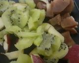 A picture of step 9 of Biscuit Rabri mixed fruit tart.