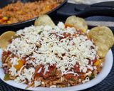 A picture of step 5 of Mexican rice pulao.
