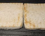 A picture of step 2 of Cheddar and brown sauce toastie.