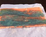 A picture of step 22 of Patriotic Vanilla Cake Roll with Whipped White Chocolate Ganache Filling and Frosting.