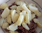 A picture of step 2 of Summer Meat Salad with New Potatoes and Cucumbers.