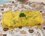 A picture of step 22 of Egg Tamagoyaki with Menma and Shiso.