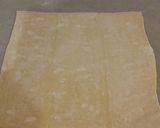 A picture of step 5 of Raspberry White Chocolate Pastry Strudels.