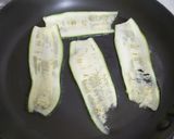 A picture of step 3 of Italian marinated zucchini with broccoli cheese pattice.