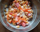 A picture of step 2 of Creamy Corn Salad In Boat.