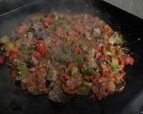 A picture of step 15 of Beef with Peanuts, Peppers, and Ginger.