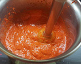 Foto del paso 6 de la receta: Pimientos rellenos de bacalao con salsa de tomate y pimientos