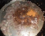 A picture of step 2 of Anda Bhurji.