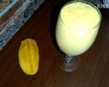 A picture of step 2 of Mango milk shake with chocolate and nuts.