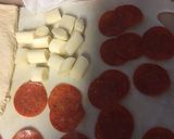 A picture of step 4 of Pepperoni and sausage cheese bombs.