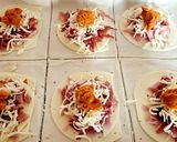 Foto del paso 3 de la receta Cañas de hojaldre de jamón serrano, jamón york, quesos y sobrasada