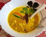 A picture of step 3 of Traditional Bengali Narkol Diye Bhaja Moong Dal.