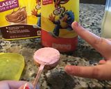 A picture of step 2 of Nesquik milkshake.