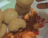 A picture of step 4 of Alkubus with onion sauce.