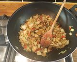 A picture of step 4 of Coconut & Lime Dhal with Aubergines & Peppers.