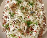 A picture of step 4 of Chessey garlic naan sticks.