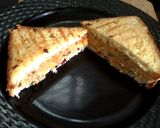 A picture of step 8 of Cheesy Egg Toast Grilled Sandwich.