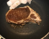 A picture of step 2 of Pork chop with onion.