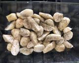 A picture of step 2 of Roasted Jerusalem Artichokes with Thyme & Kumquat.