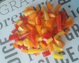 A picture of step 4 of Apple and pear chicken tikka stir fry with rice.