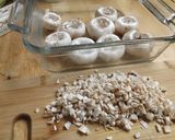 A picture of step 1 of Maggie's Simple Stuffed Mushrooms.