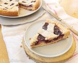 Foto del passaggio 9 della ricetta Crostata di ricotta e marmellata di ciliegie