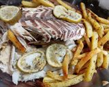 Foto del paso 2 de la receta: Merluza al natural con papas al horno