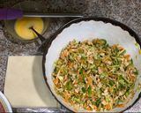 A picture of step 3 of Chicken and vegetables spring rolls.