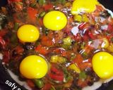 A picture of step 5 of Shakshuka with Eggs and Cheese.