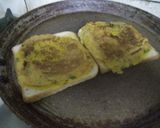 A picture of step 2 of Besan chilla open sandwich.